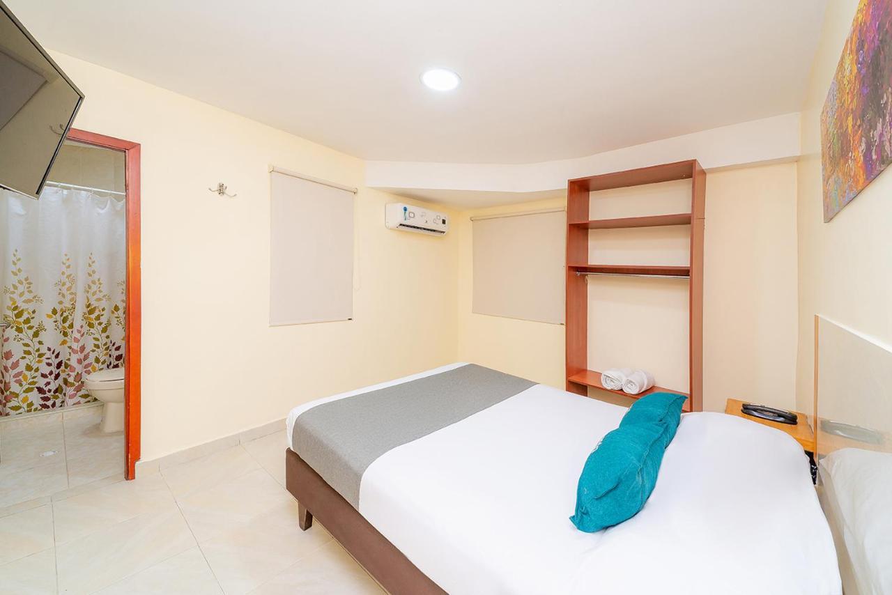 Ayenda Baly Express Hotel Malambo Exterior photo