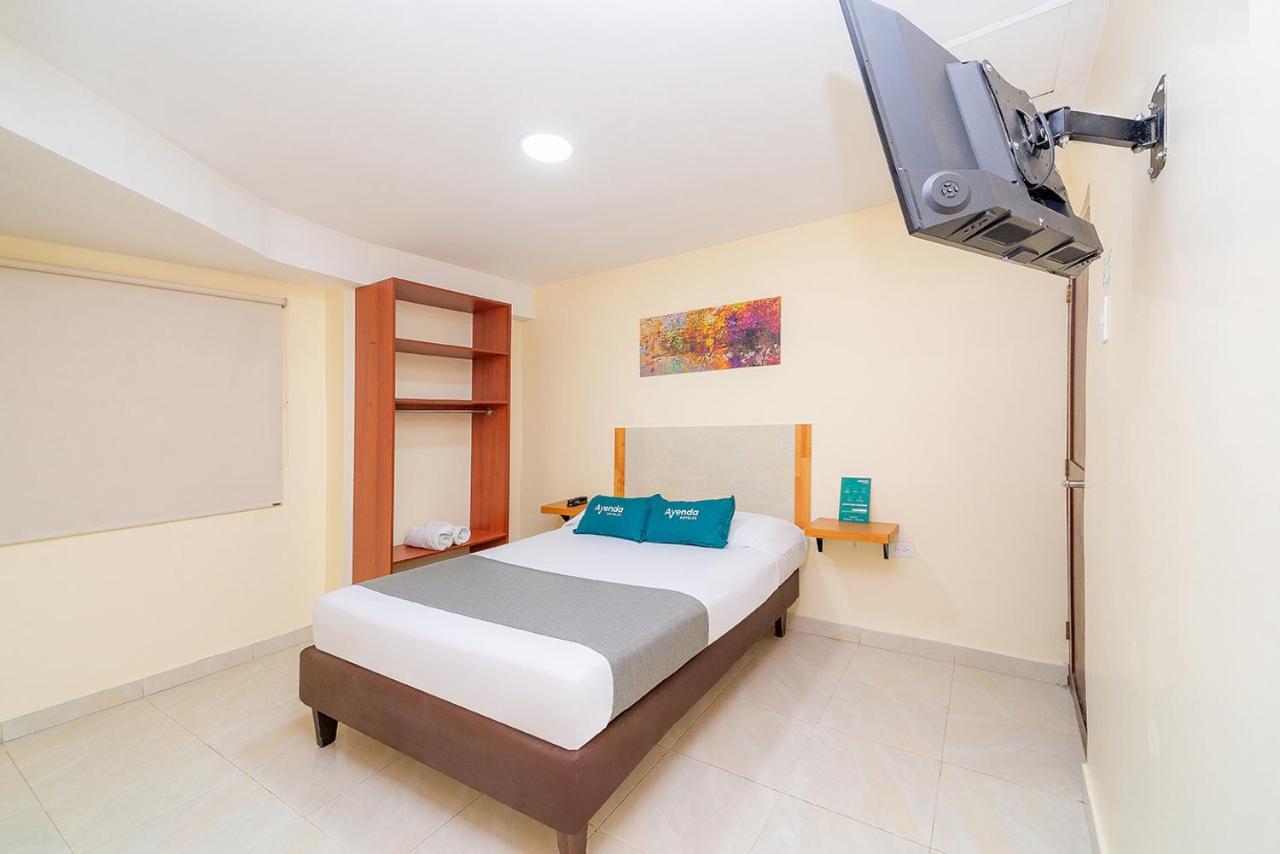 Ayenda Baly Express Hotel Malambo Exterior photo