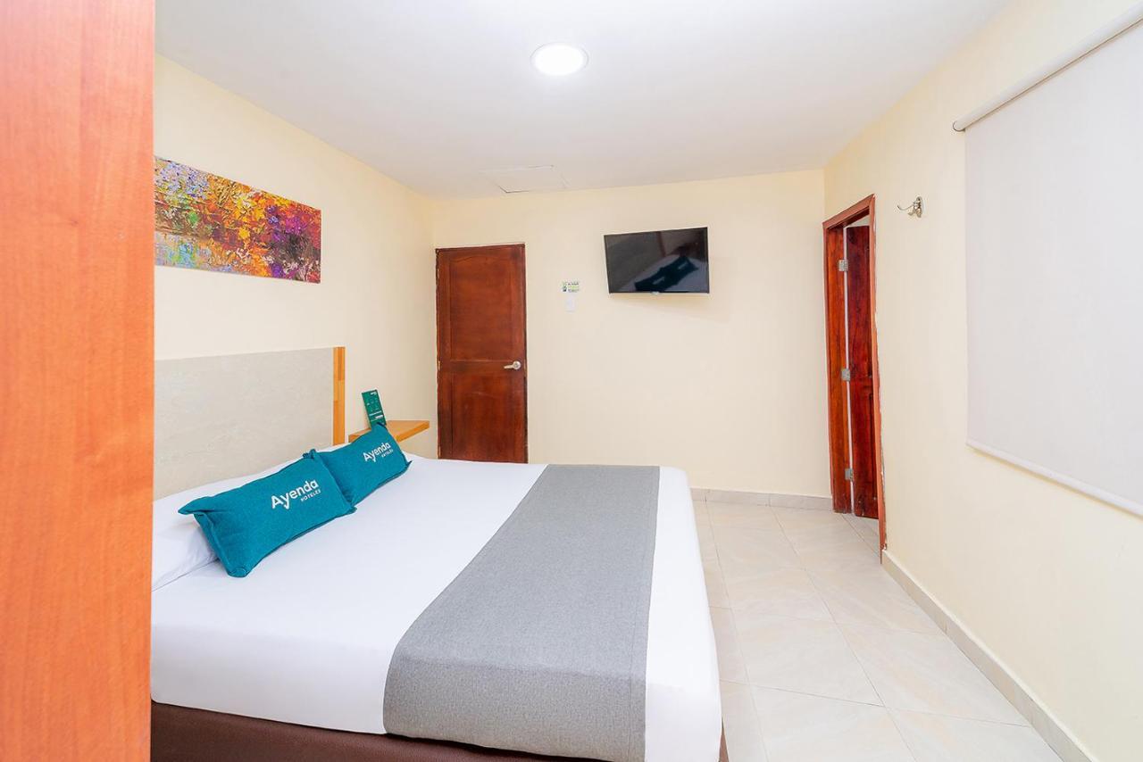 Ayenda Baly Express Hotel Malambo Exterior photo