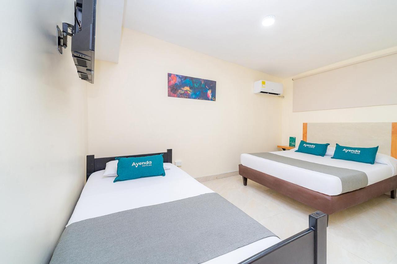 Ayenda Baly Express Hotel Malambo Exterior photo