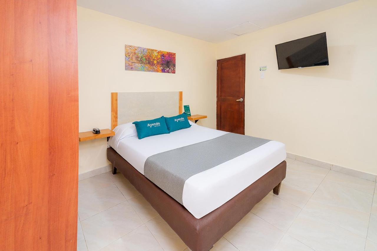 Ayenda Baly Express Hotel Malambo Exterior photo