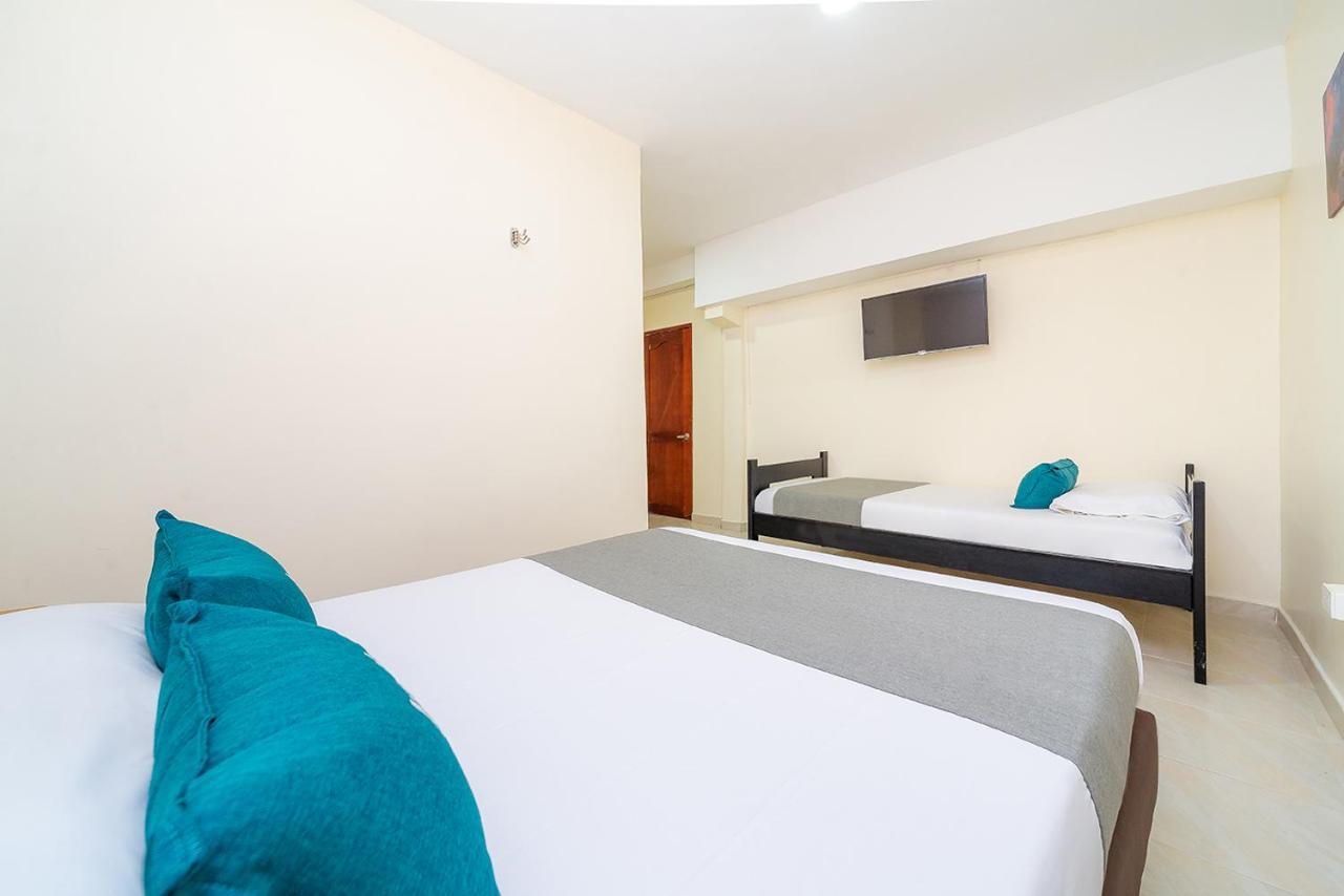 Ayenda Baly Express Hotel Malambo Exterior photo