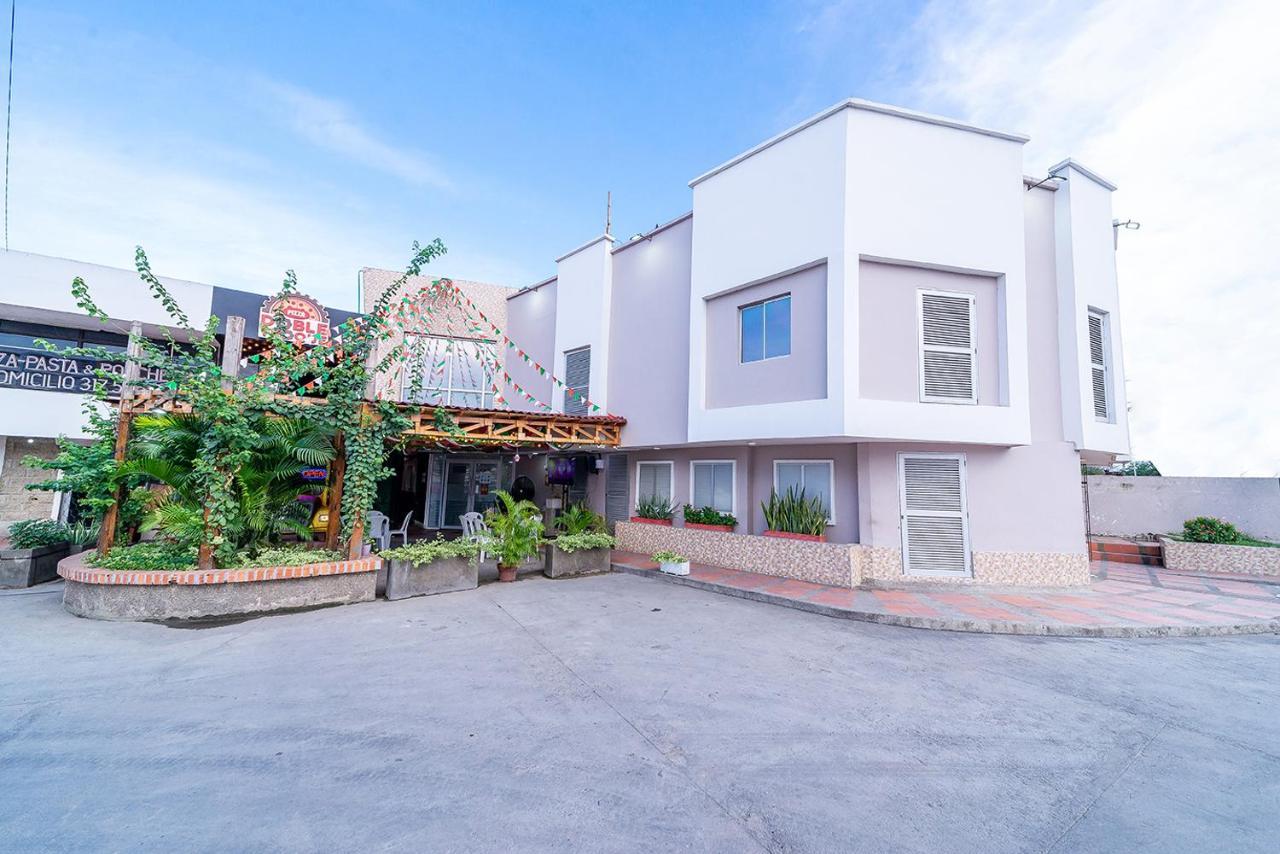 Ayenda Baly Express Hotel Malambo Exterior photo